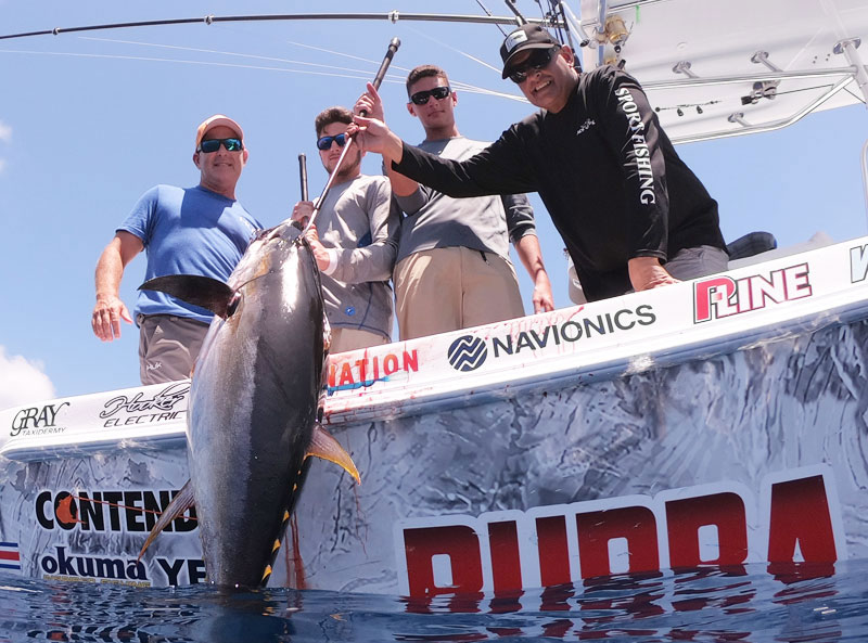 tuna on the side of the boat