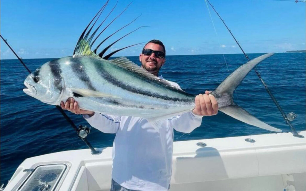 Guy holds large roosterfish